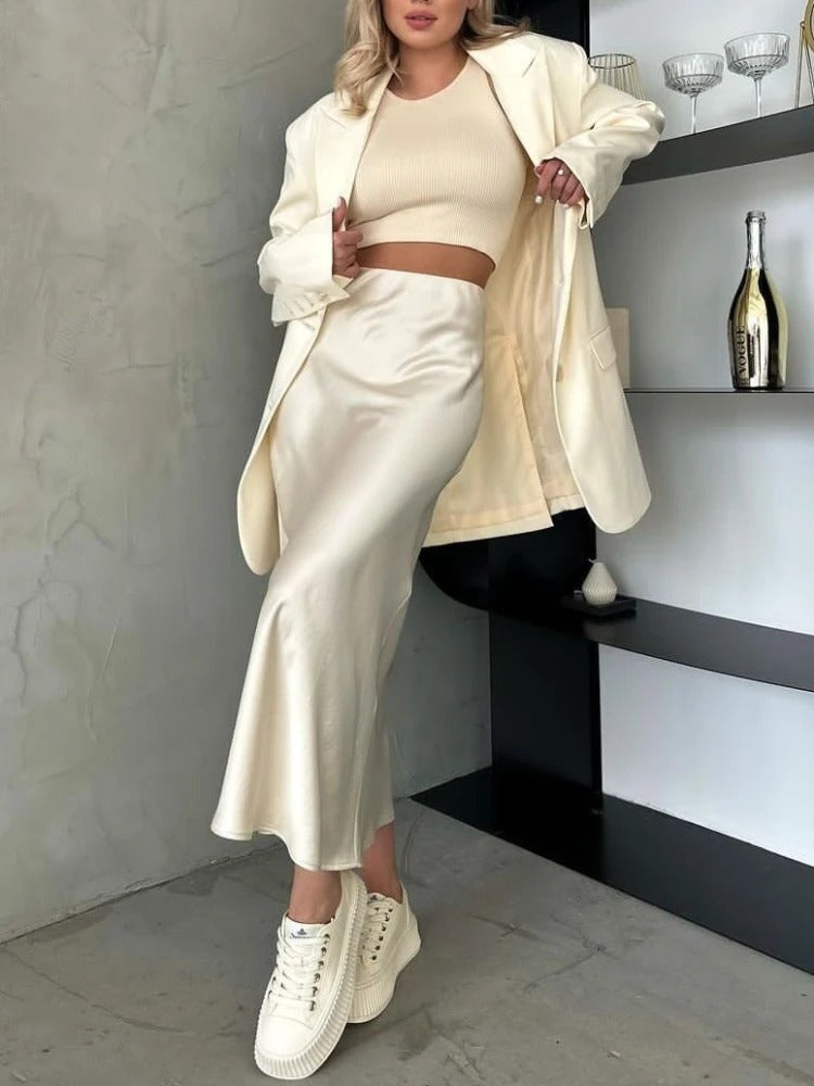 Dame fishtail polyester satin nederdel, elegant og skinnende stof, høj talje, feminint udvidet kant.