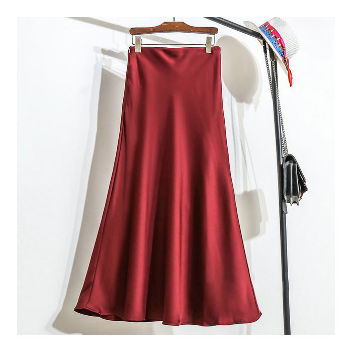 Dame fishtail polyester satin nederdel, elegant og skinnende stof, høj talje, feminint udvidet kant.