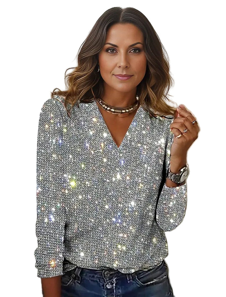 Dame glitter bluse, V-hals, langærmet, glitrende overflade, metallisk glans, festtøj, stilfuldt look.