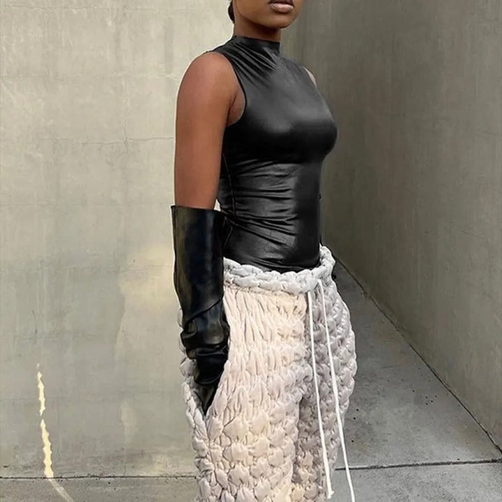 Dame ærmeløs bodycon tanktop, sort, rund hals, minimalistisk look, perfekt til afslappede og stilfulde outfits