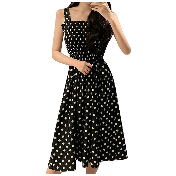 Dame ærmeløs casual kjole med polka dot mønster, let, luftig og elegant, perfekt til sommerstil.