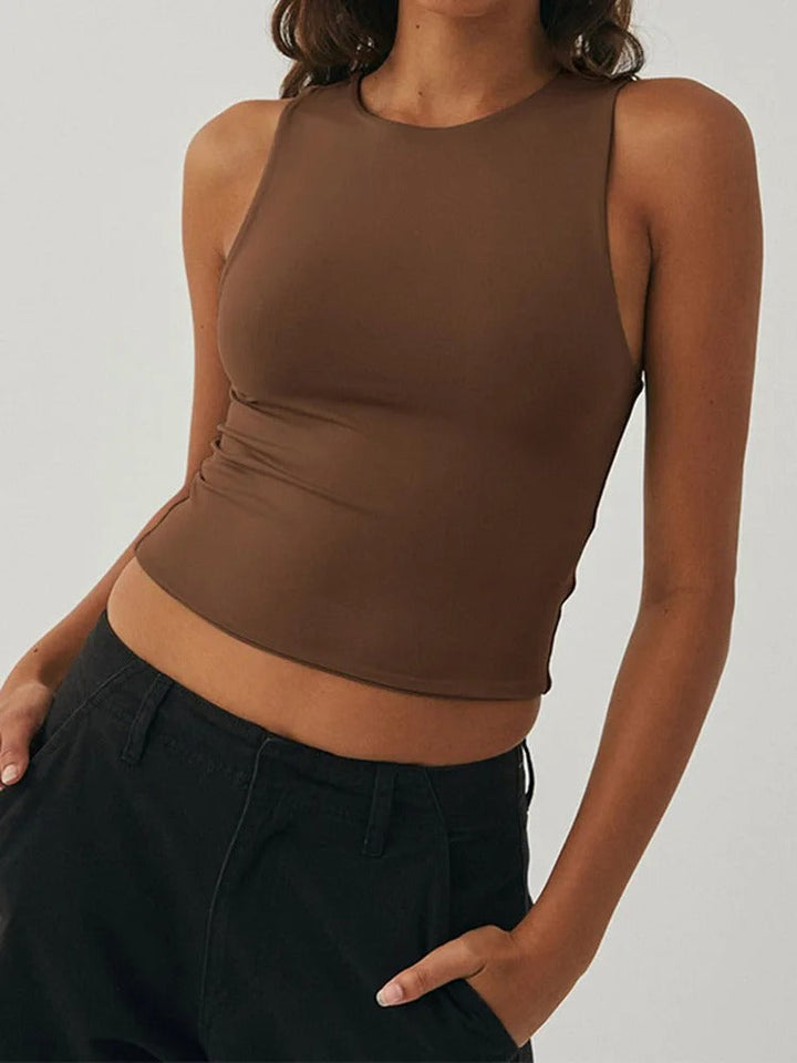 Dame ærmeløs sports top, slim fit, rund hals, elegant design, åndbar, til sport og fritid
