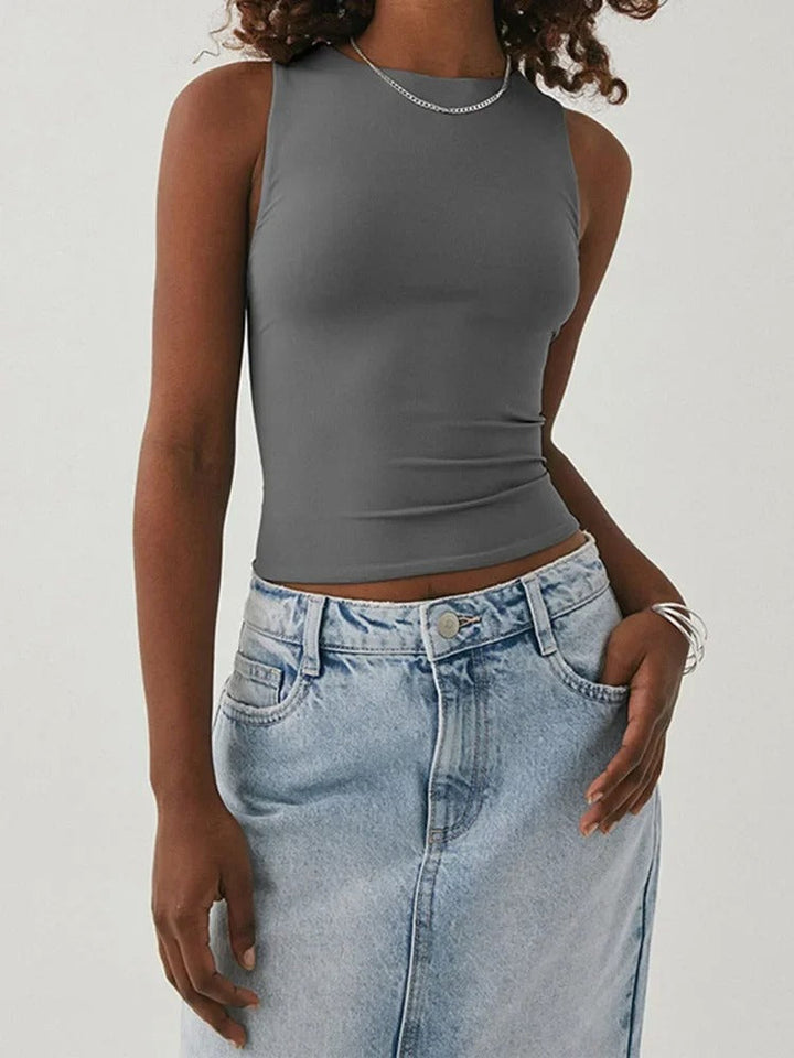 Dame ærmeløs sports top, slim fit, rund hals, elegant design, åndbar, til sport og fritid