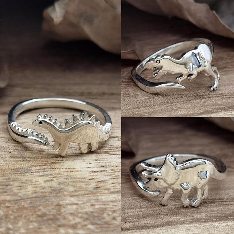Dame sølv dinosaurussring med hvidguldbelægning, tilgængelig med Tyranno eller Tricera-motiver, stilfuld og legesyg.