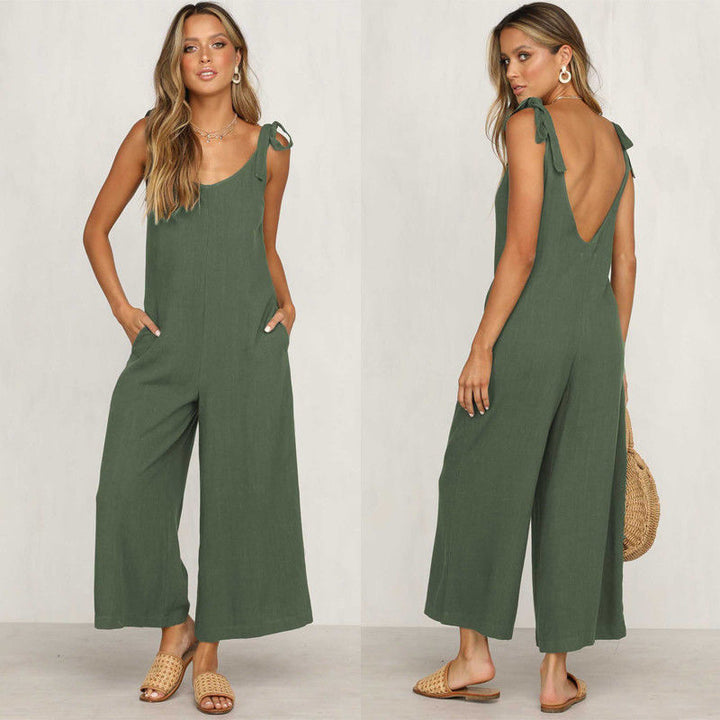 Dame jumpsuit forfra med vide ben og åben ryg, perfekt til sommeren.