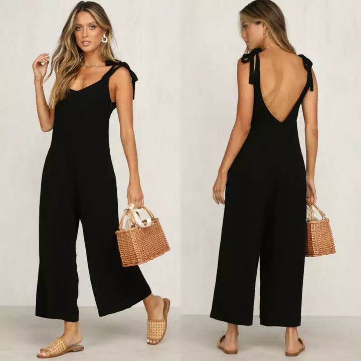 Dame jumpsuit forfra med vide ben og åben ryg, perfekt til sommeren.