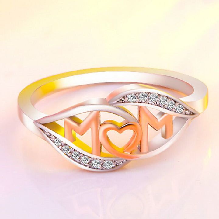Dame elegant mor-ring, rosaguld med zirkon-detaljer, elegant skinnende finish, ideel gave til mor.
