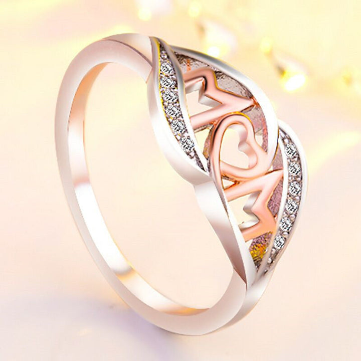 Dame elegant mor-ring, rosaguld med zirkon-detaljer, elegant skinnende finish, ideel gave til mor.
