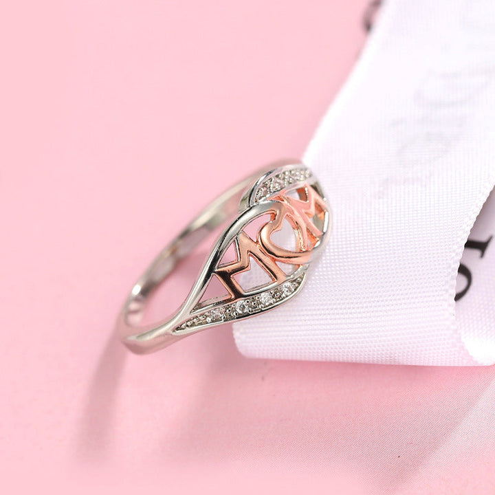 Dame elegant mor-ring, rosaguld med zirkon-detaljer, elegant skinnende finish, ideel gave til mor.