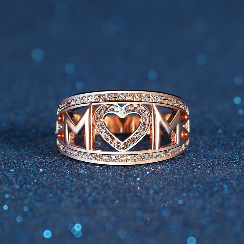 Dame elegant mor-ring, rosaguld med zirkon-detaljer, elegant skinnende finish, ideel gave til mor.