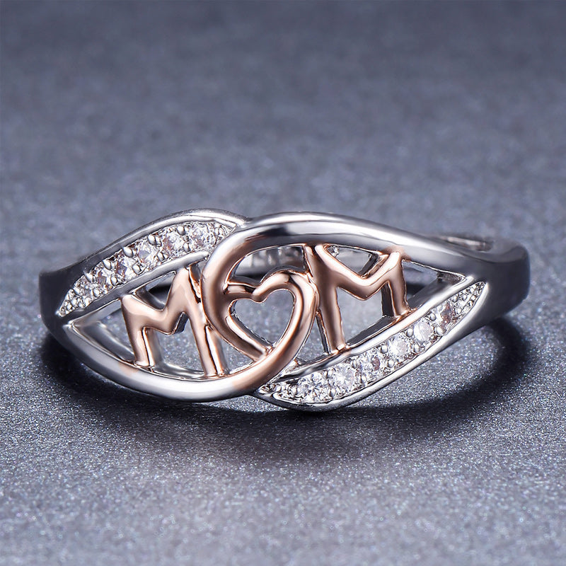 Dame elegant mor-ring, rosaguld med zirkon-detaljer, elegant skinnende finish, ideel gave til mor.