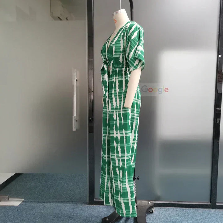Dame jumpsuit med dyb V-hals, vide ben og blonde detaljer, sommerkjole