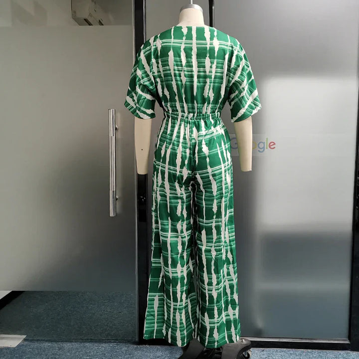Dame jumpsuit med dyb V-hals, vide ben og blonde detaljer, sommerkjole
