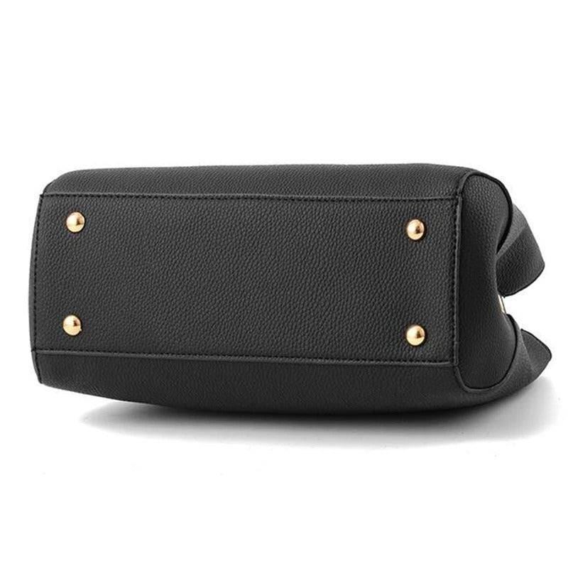 Dame skuldertaske med blomsterhåndtag, struktureret tote-stil, skinnende finish, justerbar rem.