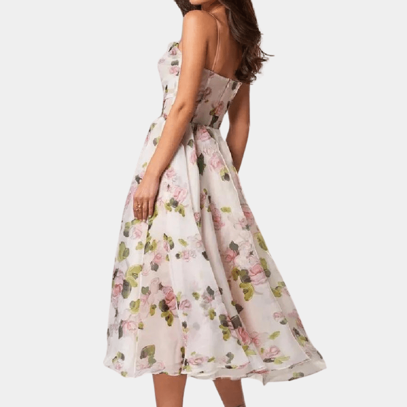Damekjole i mellem længde, unikt design, elegant look, velegnet til fester og afslappede lejligheder.