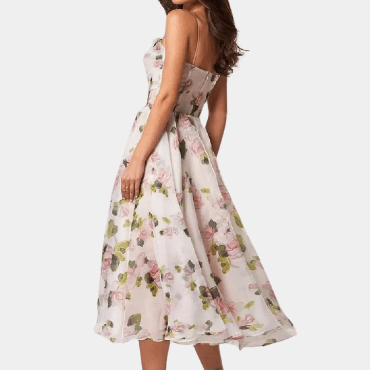 Damekjole i mellem længde, unikt design, elegant look, velegnet til fester og afslappede lejligheder.