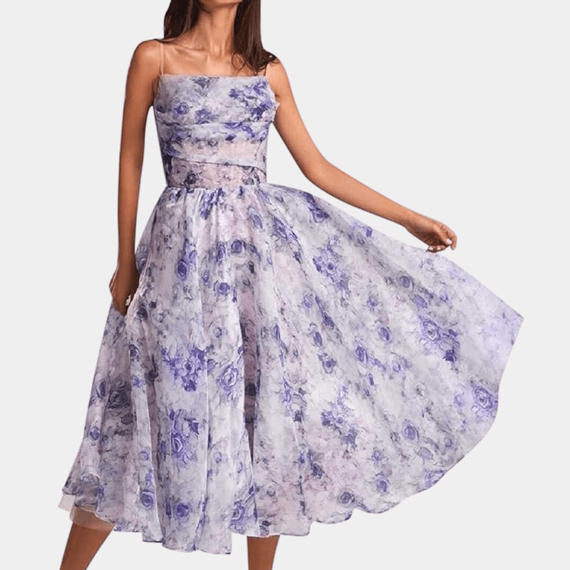 Damekjole i mellem længde, unikt design, elegant look, velegnet til fester og afslappede lejligheder.