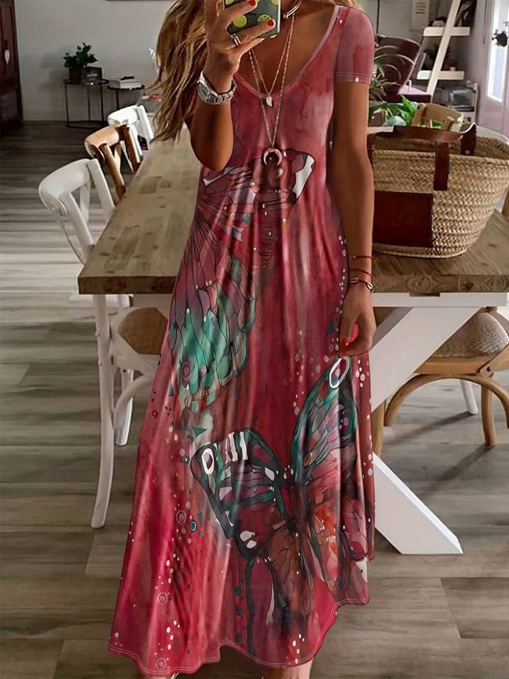 Dame sommerkjole med V-udskæring, sommerfuglprint, let og elegant til sommerfester, blød og nem at pleje.