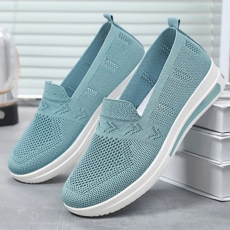 Dame forårs-sommer mesh sneakers, lette og åndbare, i hvidt mesh-materiale, perfekte til sommerbrug.