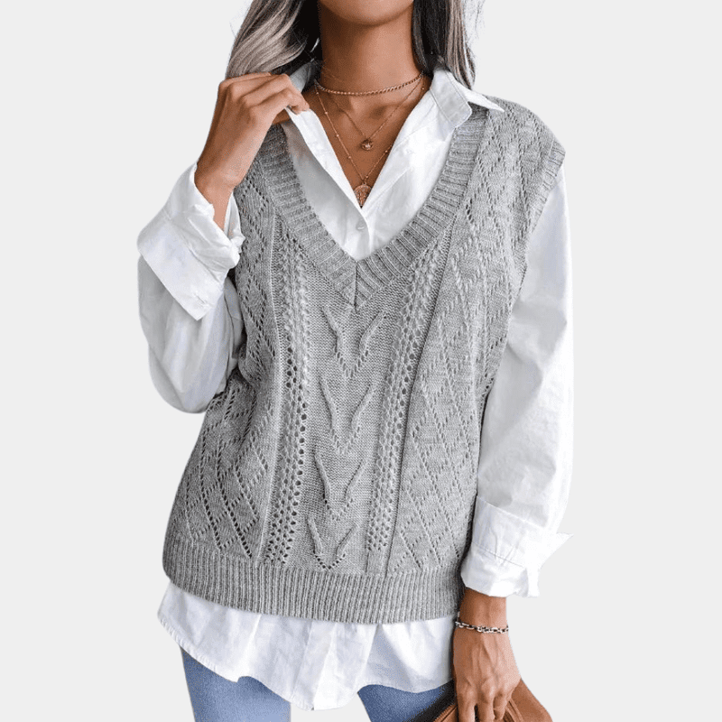 Dame let V-hals strikket vest med stilfuldt diamantmønster. Perfekt til lag-på-lag.