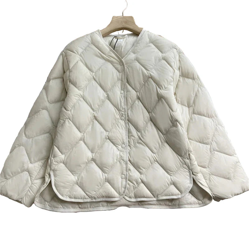 "Naisten kevyt kaulukseton puffer-takki, beige, syksyyn ja talveen, mukava ja moderni muotoilu, lämpöä arkeen."