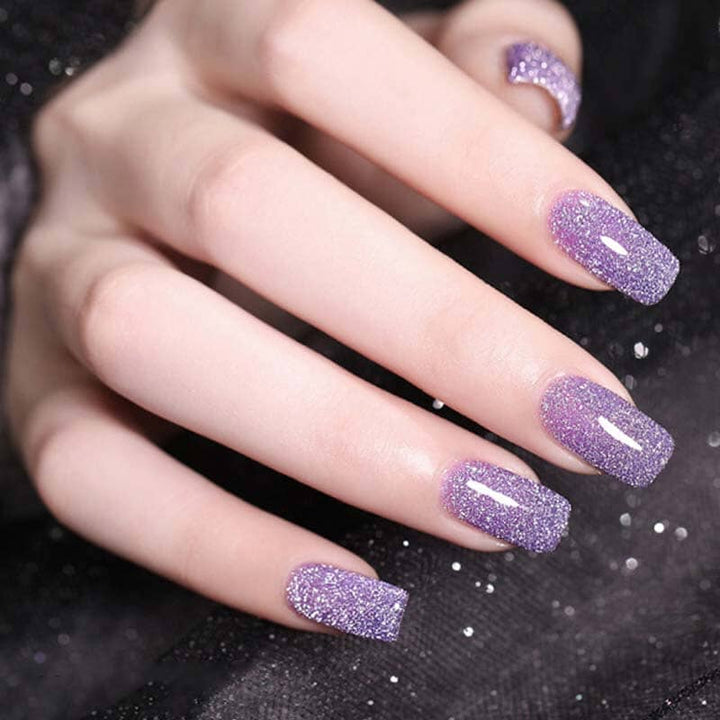 Dame høj-densitet glitter gel polish, skinnende pink nuance, 8 ml flaske, elegant gel neglelak til hjemmebrug.