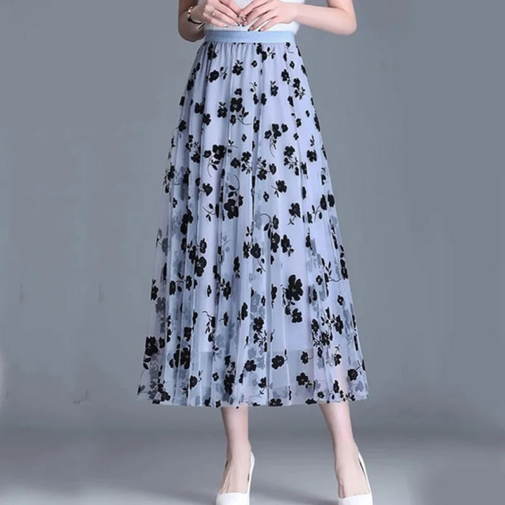 Dame elegant midi-nederdel med blomstermønster og høj talje, luftig og charmerende blomsterprint, perfekt til afslappede lejligheder.