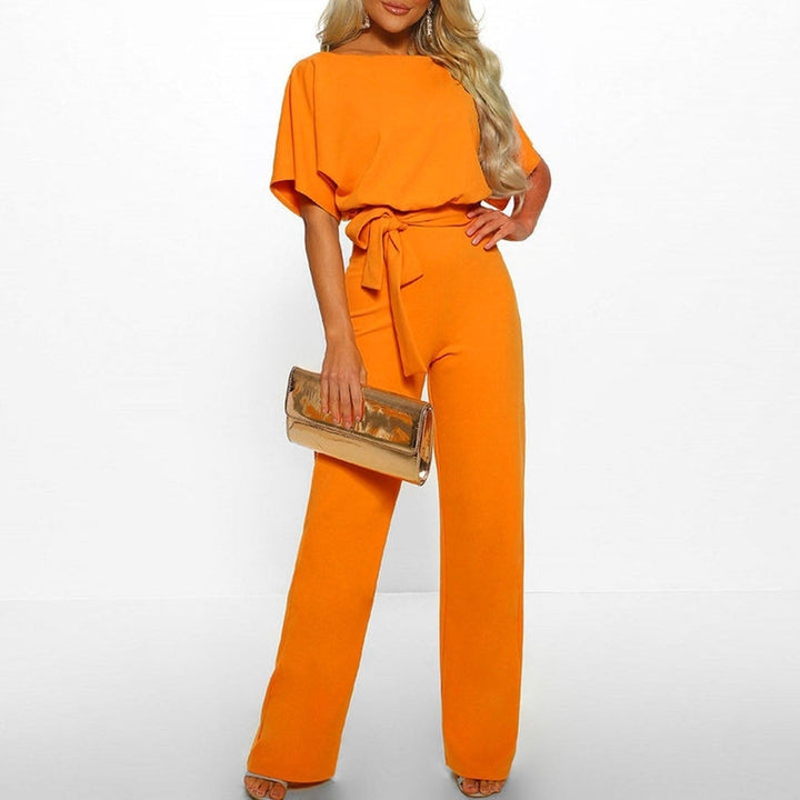 Dame jumpsuit med høj talje og vide ben, fitted overdel, stilfuldt snit.