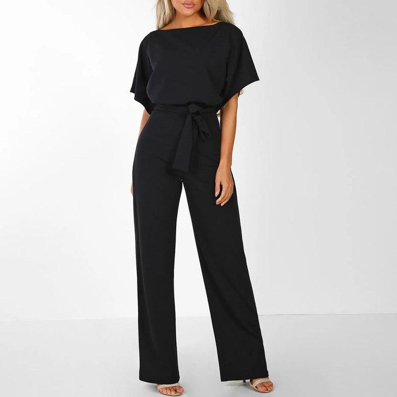 Dame jumpsuit med høj talje og vide ben, fitted overdel, stilfuldt snit.
