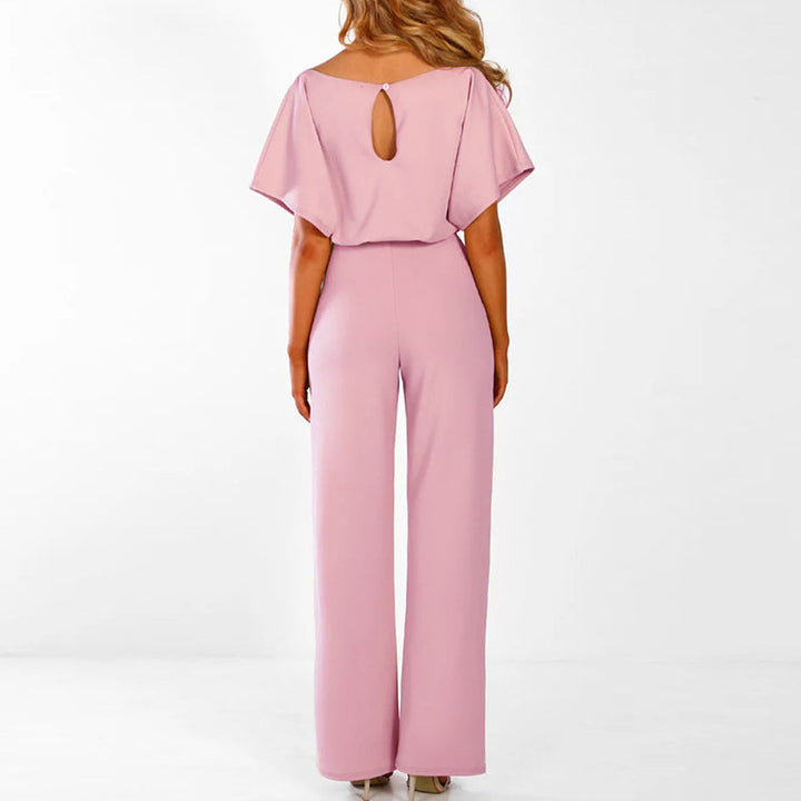 Dame jumpsuit med høj talje og vide ben, fitted overdel, stilfuldt snit.