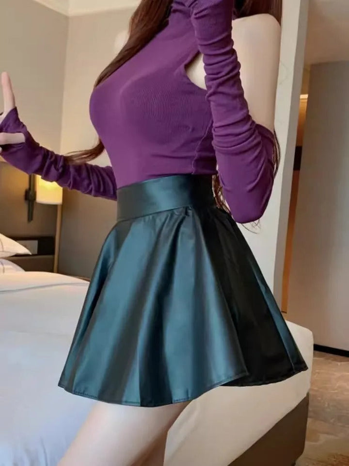 Dame plisseret nederdel med høj talje, sort, elegant midi-længde, velegnet til fest eller hverdag.