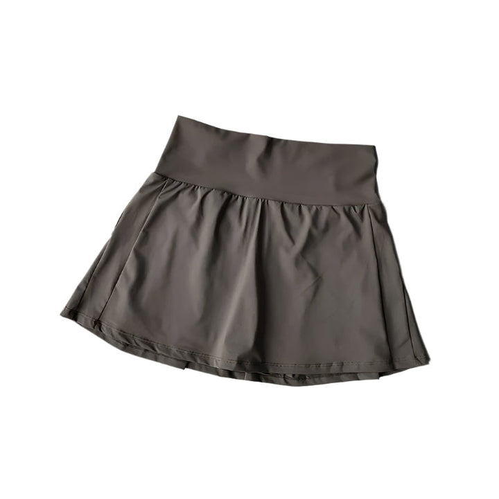 Damehøjtaljede sportsnederdel med shorts, stilfuld og åndbar, perfekt til tennis og yoga.