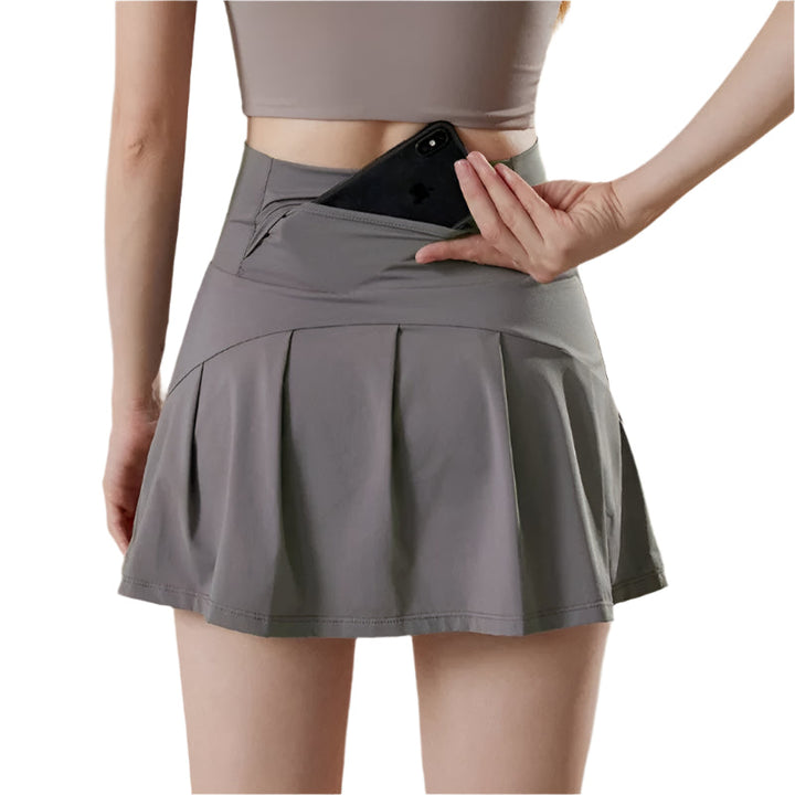 Damehøjtaljede sportsnederdel med shorts, stilfuld og åndbar, perfekt til tennis og yoga.