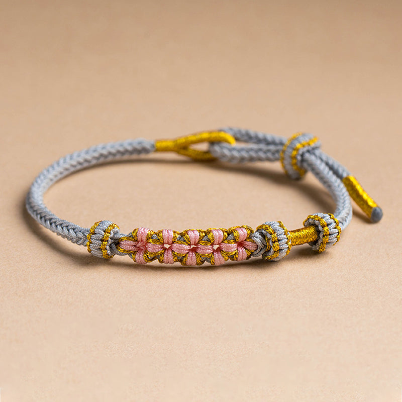 Dame håndvævet persikablomst armbånd, justerbart, flerfarvet knudemønster, højkvalitets materialer, etnisk stil