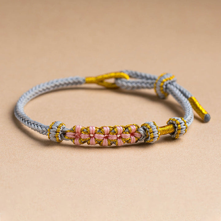 Dame håndvævet persikablomst armbånd, justerbart, flerfarvet knudemønster, højkvalitets materialer, etnisk stil
