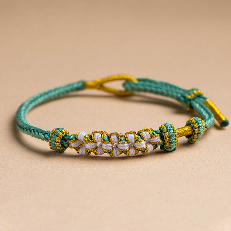 Dame håndvævet persikablomst armbånd, justerbart, flerfarvet knudemønster, højkvalitets materialer, etnisk stil