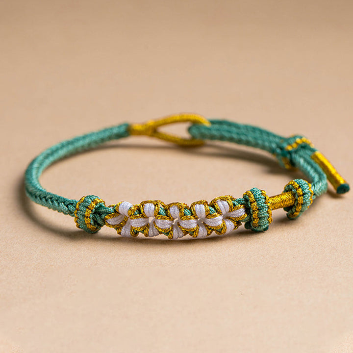 Dame håndvævet persikablomst armbånd, justerbart, flerfarvet knudemønster, højkvalitets materialer, etnisk stil