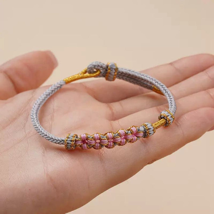 Dame håndvævet persikablomst armbånd, justerbart, flerfarvet knudemønster, højkvalitets materialer, etnisk stil