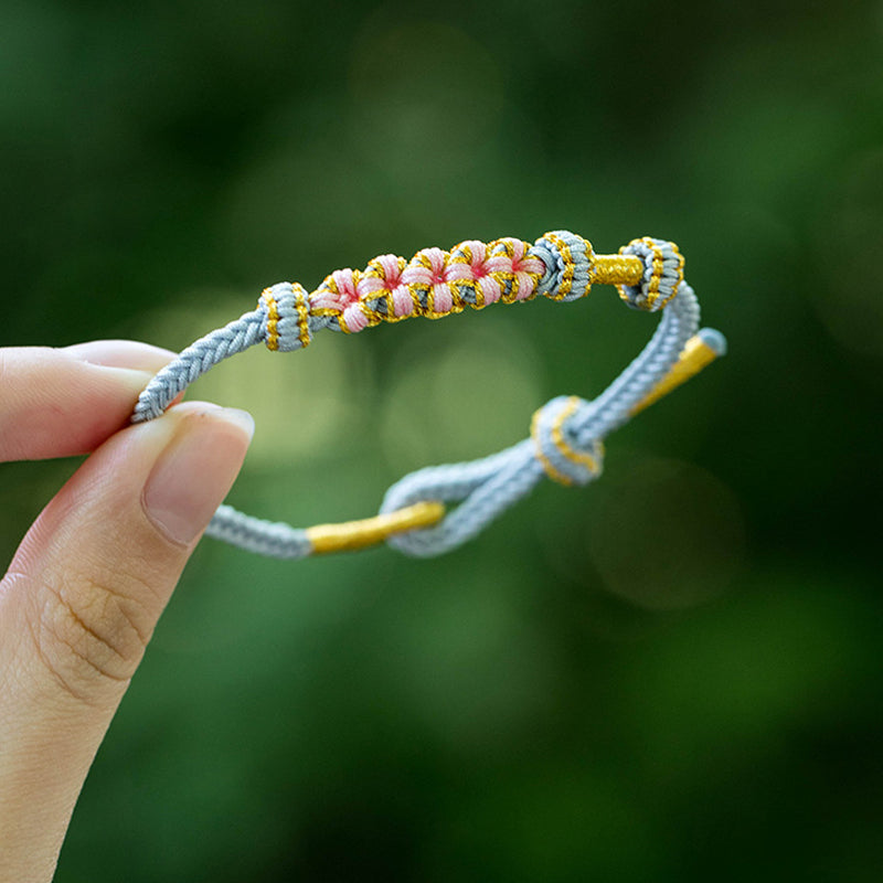 Dame håndvævet persikablomst armbånd, justerbart, flerfarvet knudemønster, højkvalitets materialer, etnisk stil