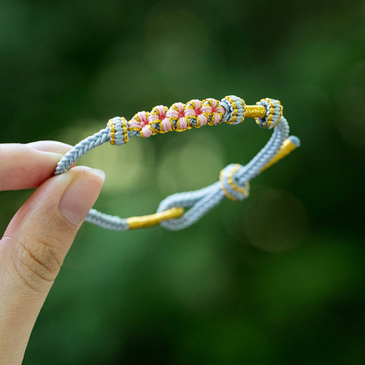 Dame håndvævet persikablomst armbånd, justerbart, flerfarvet knudemønster, højkvalitets materialer, etnisk stil