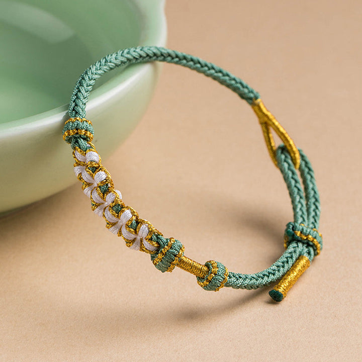 Dame håndvævet persikablomst armbånd, justerbart, flerfarvet knudemønster, højkvalitets materialer, etnisk stil
