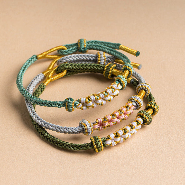 Dame håndvævet persikablomst armbånd, justerbart, flerfarvet knudemønster, højkvalitets materialer, etnisk stil