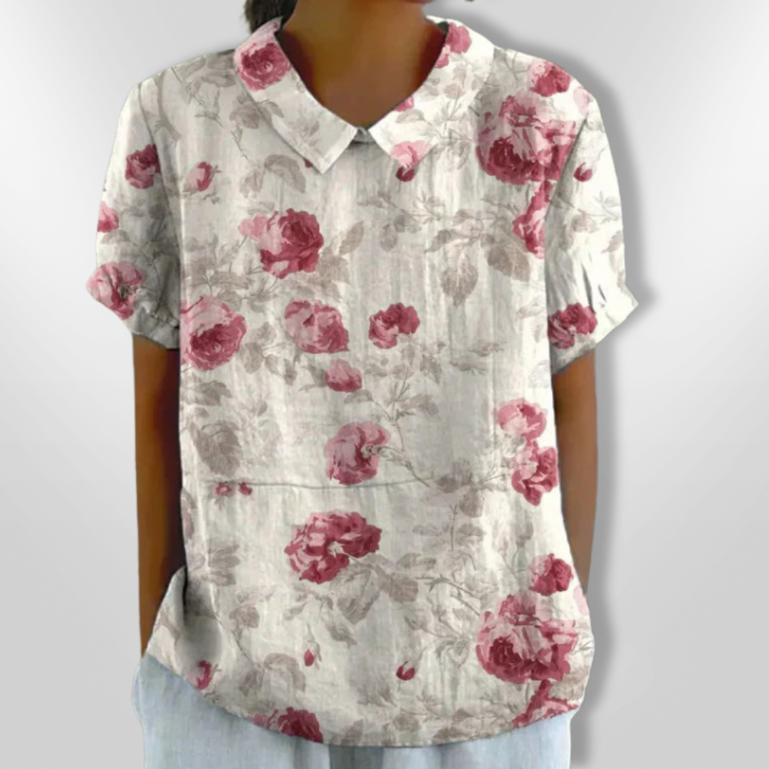 Damebluse med blomsterprint, afslappet stil, blomstermønster, klassisk krave, korte ærmer, let stof, egnet til hverdag og fest.