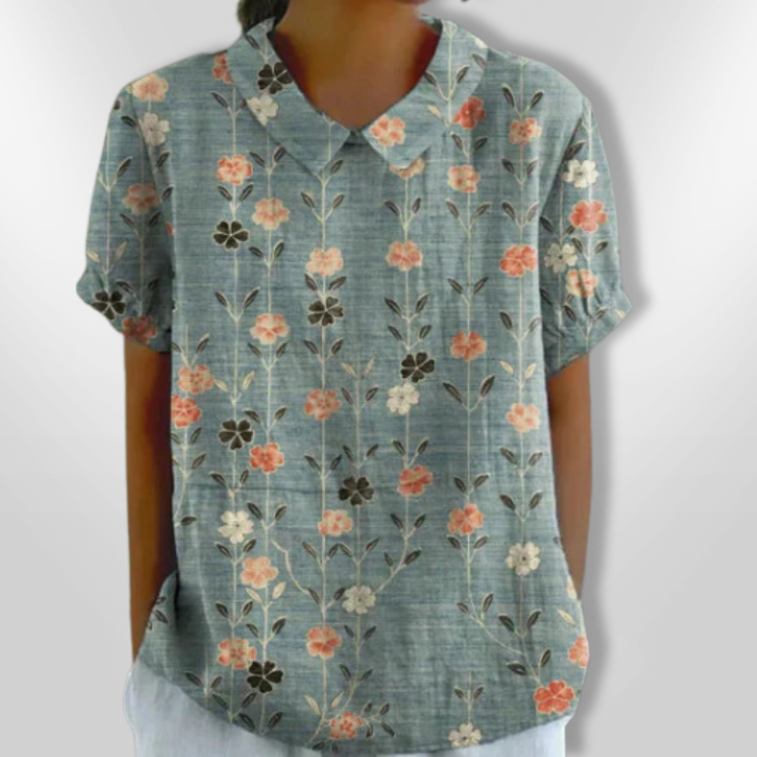 Damebluse med blomsterprint, afslappet stil, blomstermønster, klassisk krave, korte ærmer, let stof, egnet til hverdag og fest.
