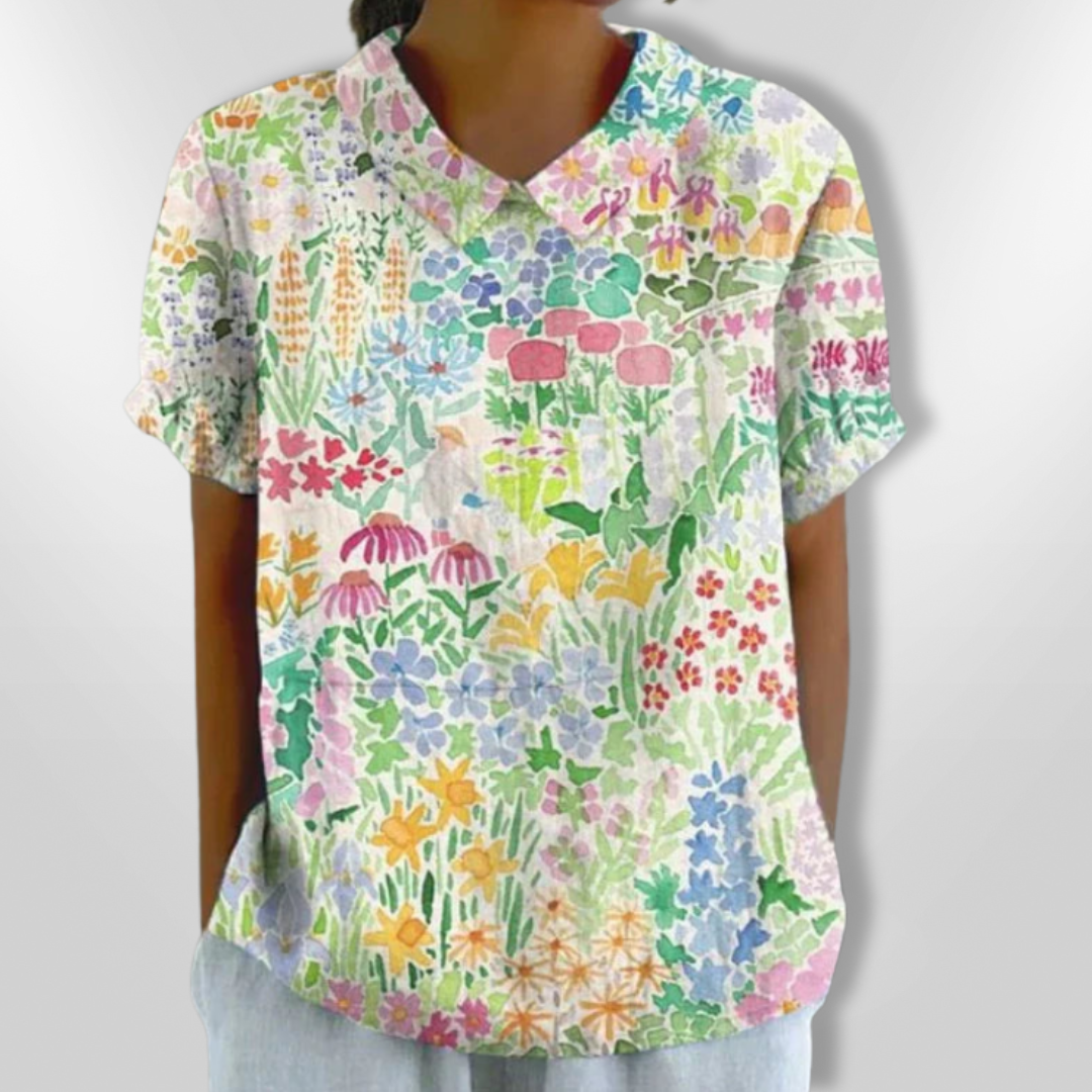 Damebluse med blomsterprint, afslappet stil, blomstermønster, klassisk krave, korte ærmer, let stof, egnet til hverdag og fest.
