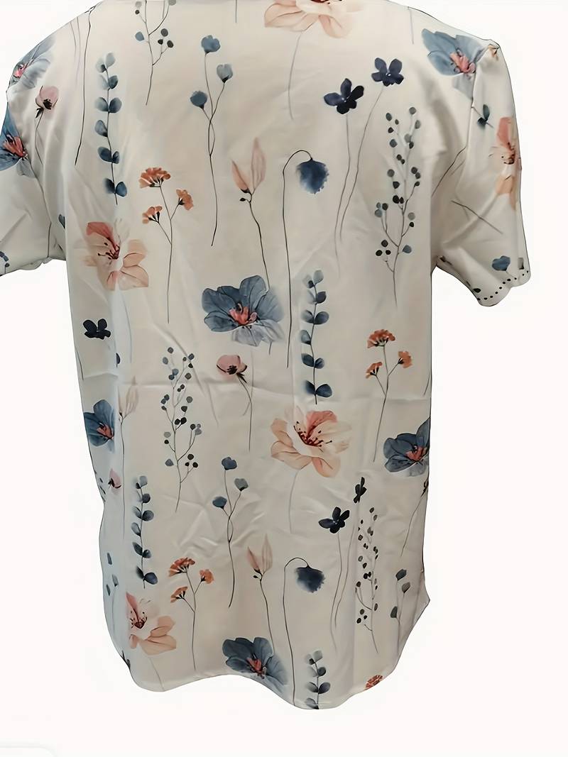 Dameblomstret bluse til foråret, løs pasform, delikat blomstermønster, blød og behagelig.