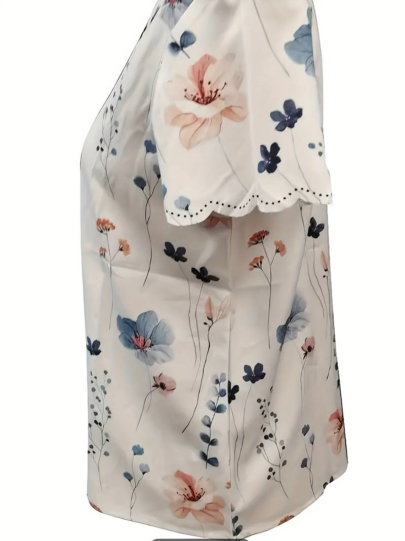 Dameblomstret bluse til foråret, løs pasform, delikat blomstermønster, blød og behagelig.