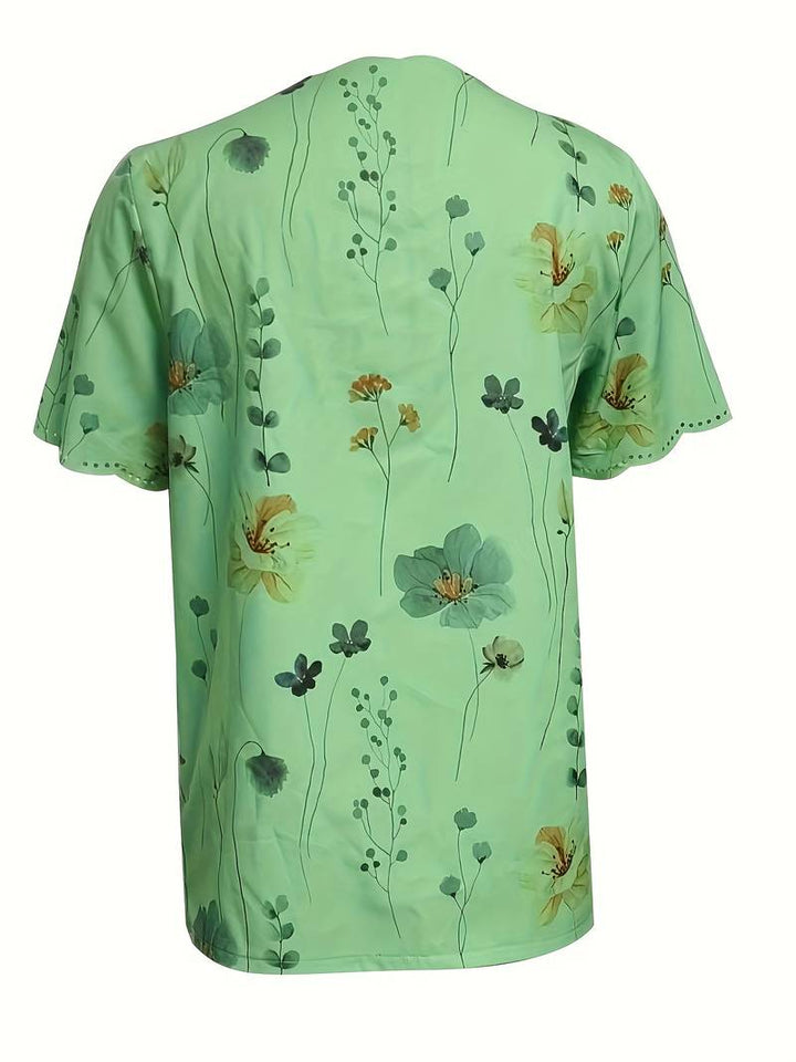 Dameblomstret bluse til foråret, løs pasform, delikat blomstermønster, blød og behagelig.