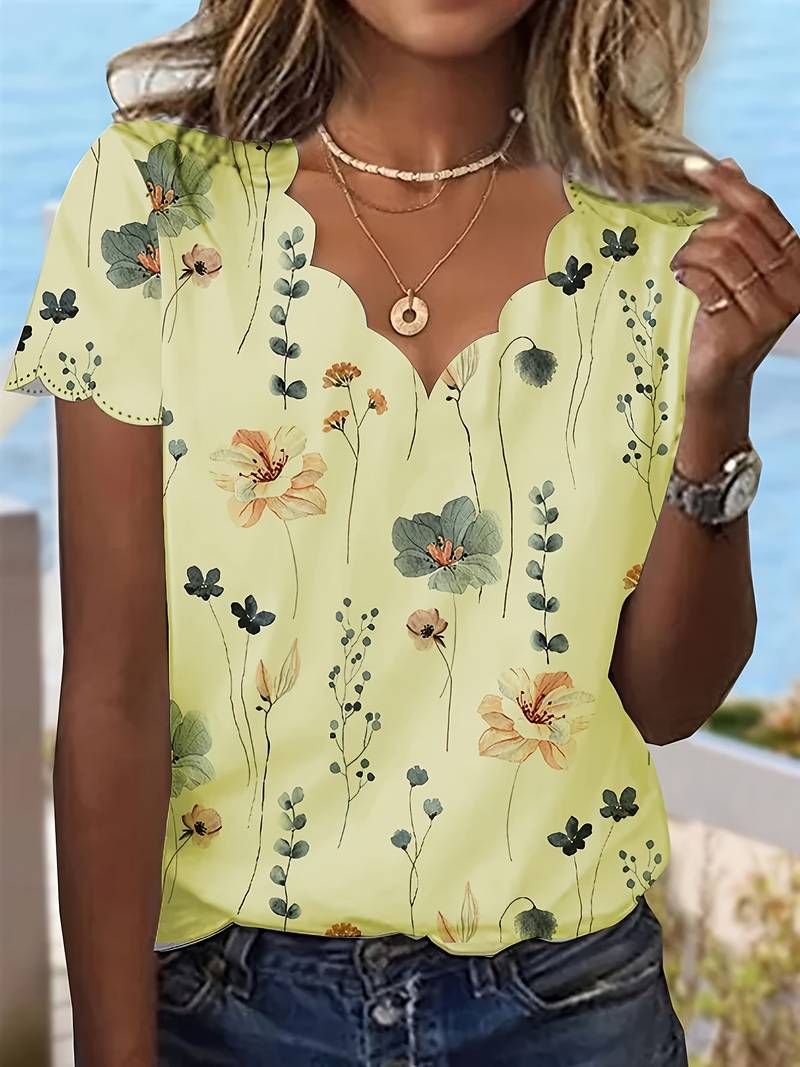 Dameblomstret bluse til foråret, løs pasform, delikat blomstermønster, blød og behagelig.