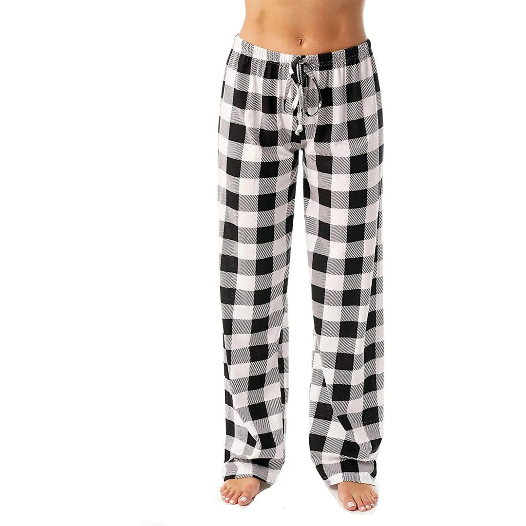 Dame vidt benede ternede pyjamasbukser, klassisk ternet mønster, blødt materiale, komfort og stil til vinteraftener.